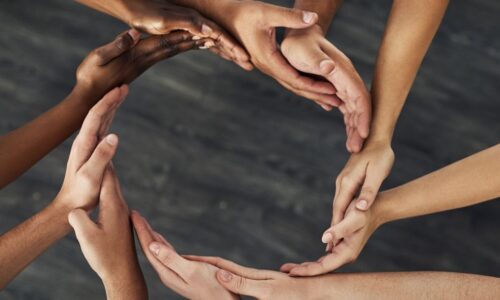 a circle of hands